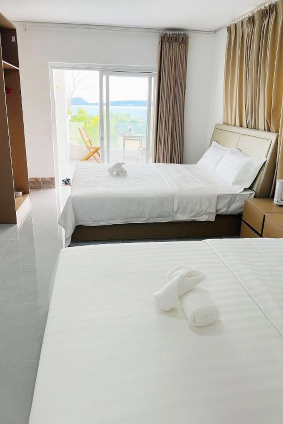 Deluxe Triple Room, Sea View | Desk, free WiFi
