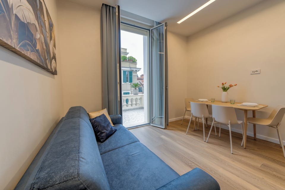 Exclusive Room, Balcony, City View | Living area | 39-inch flat-screen TV with digital channels, printers