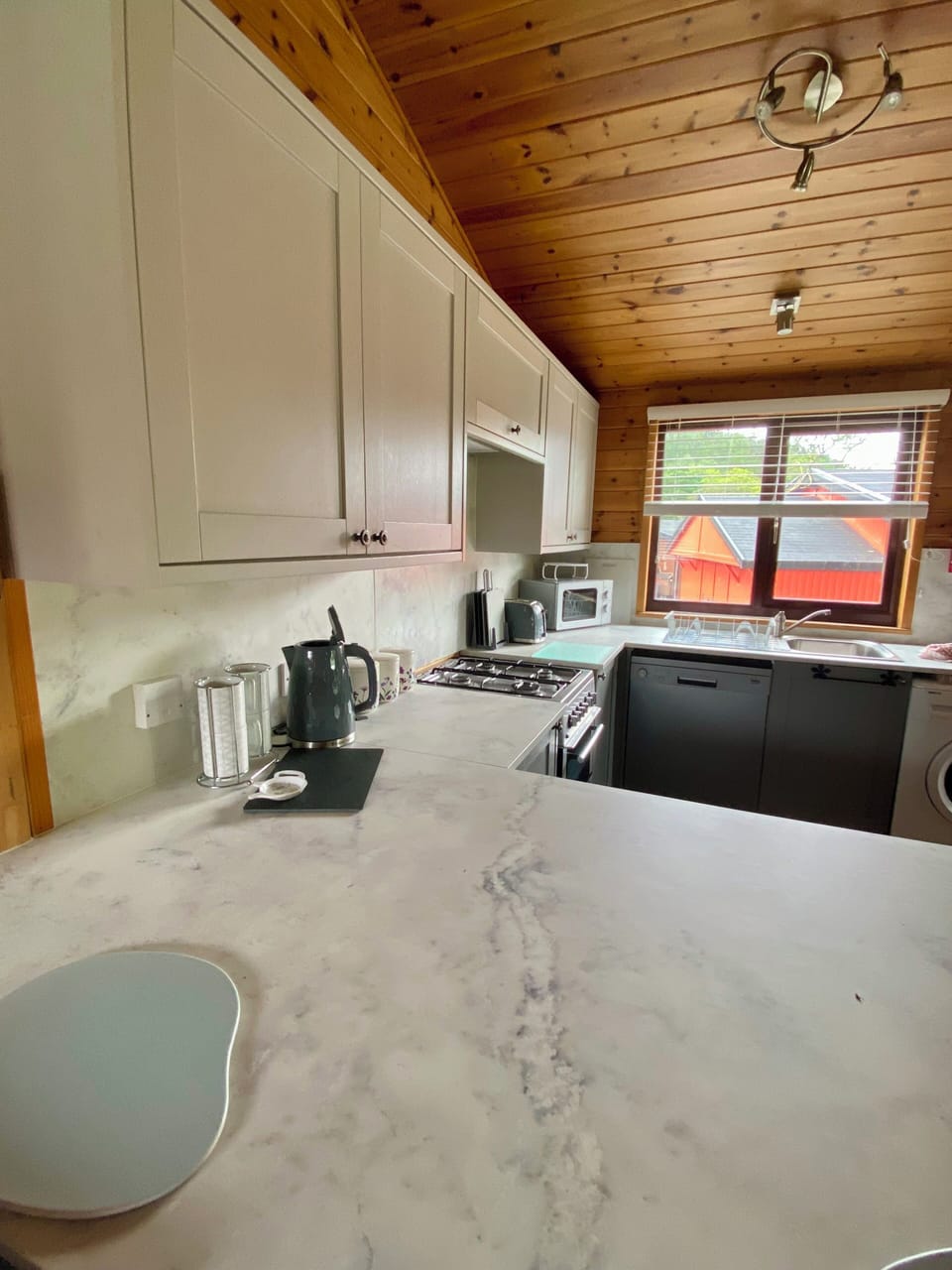 Cabin, 2 Bedrooms | Private kitchen | Fridge, microwave, coffee/tea maker, electric kettle