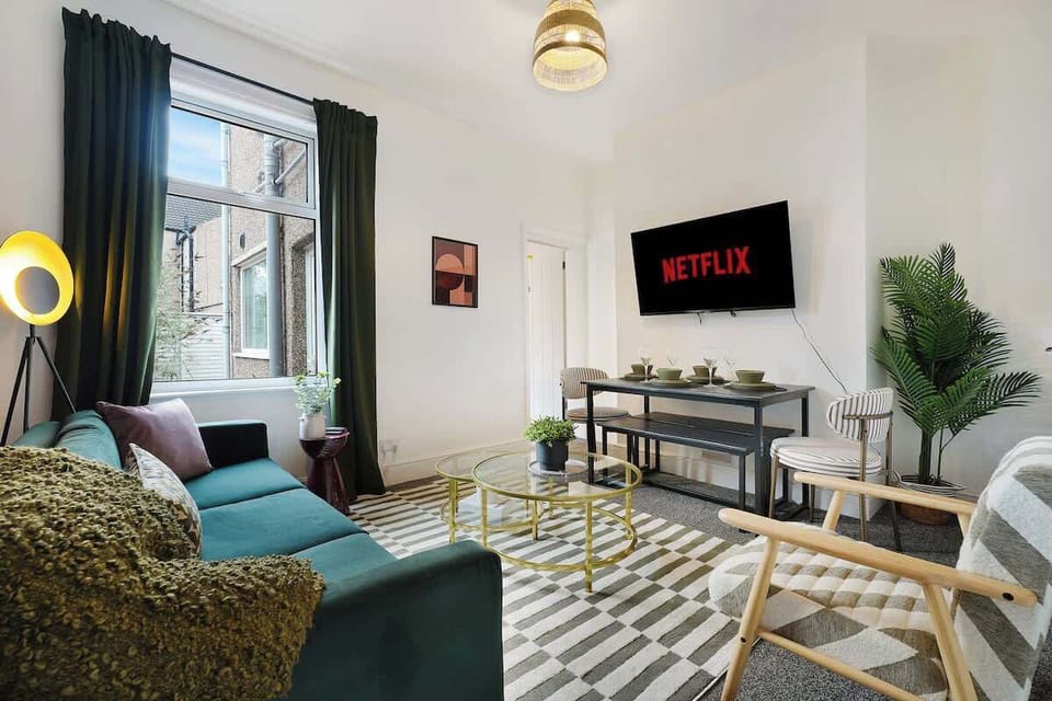 Stylish and comfortable living area, perfect for unwinding, socialising, or enjoying a quiet evening in.