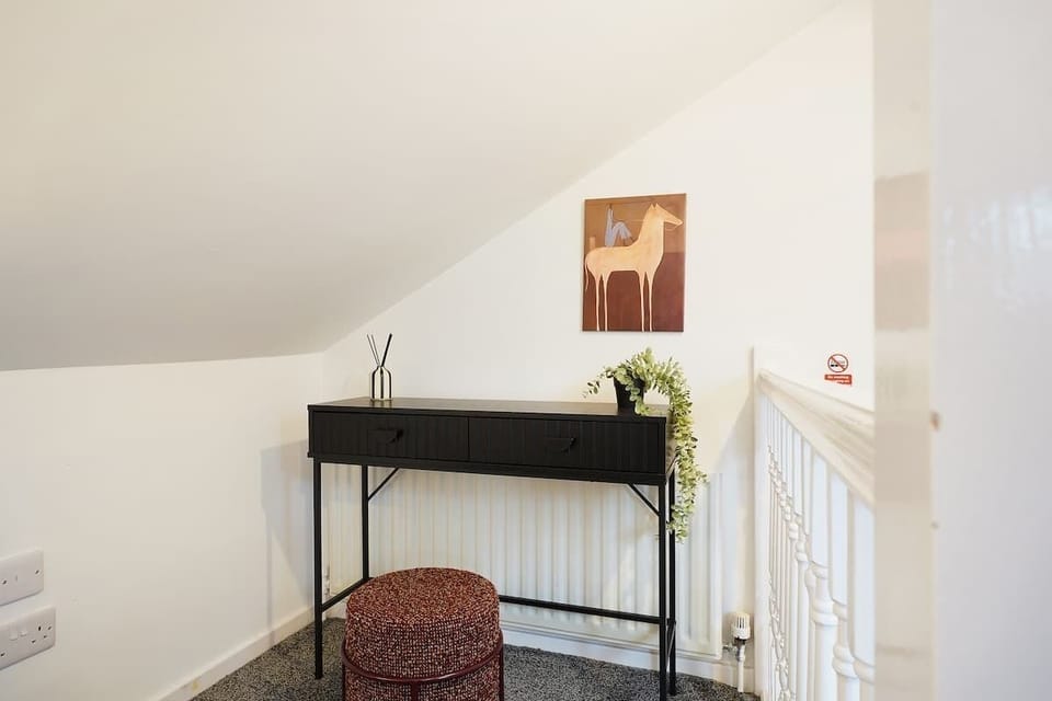 Comfortable and practical bedroom designed for a peaceful and convenient stay.