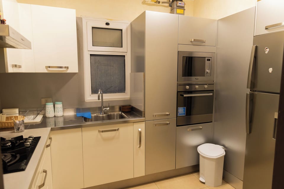 Deluxe Apartment, Private Bathroom, Garden View | Private kitchen | Full-size fridge, microwave, oven, stovetop