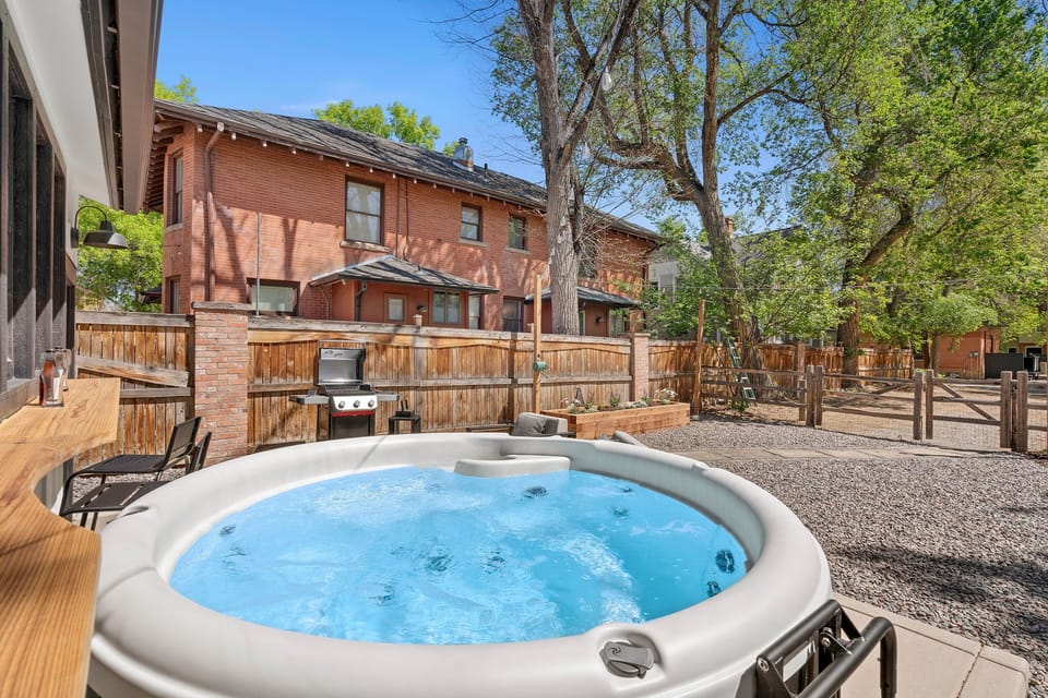 Backyard | Private Hot Tub, Lounge Seating, Fire Pit