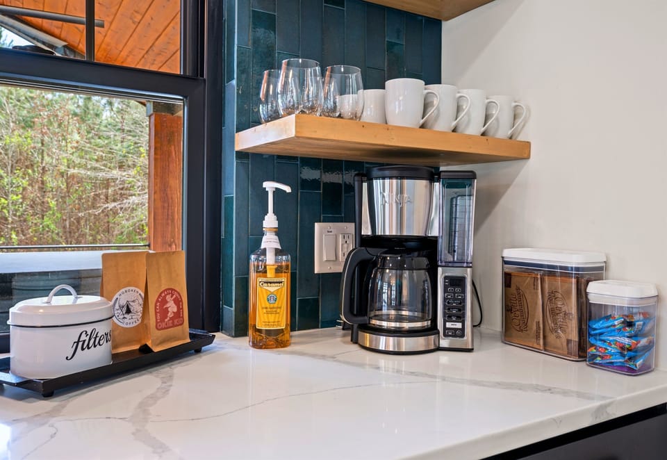 A cozy coffee station is set up and ready for slow mornings, giving you everything you need to start the day with a fresh cup and a relaxed pace.