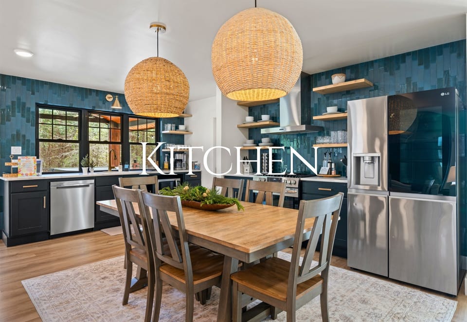 This beautifully designed kitchen combines modern finishes, ample counter space, and warm textures, making it both functional and a great place to gather.