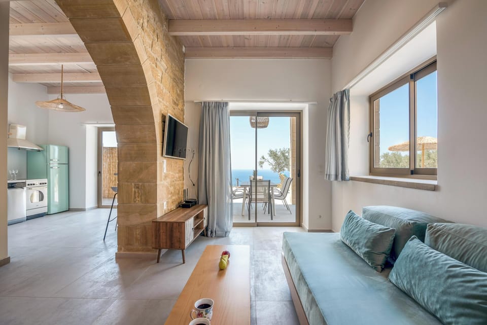 Villa, Sea View | Living area | 27-inch Smart TV with satellite channels