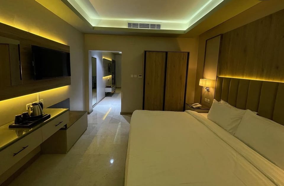 Junior Suite | Blackout drapes, iron/ironing board (on request), WiFi (free)