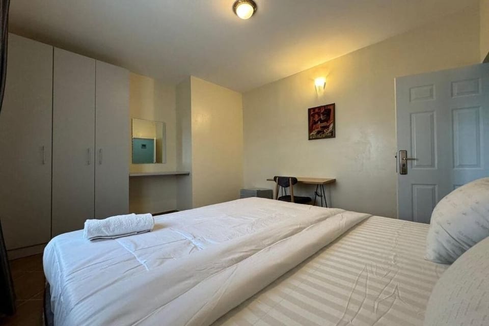 Economy Apartment, Balcony, City View | Desk, laptop workspace, blackout drapes, soundproofing