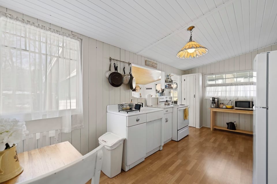 Large kitchen area opens up to back porch and living area