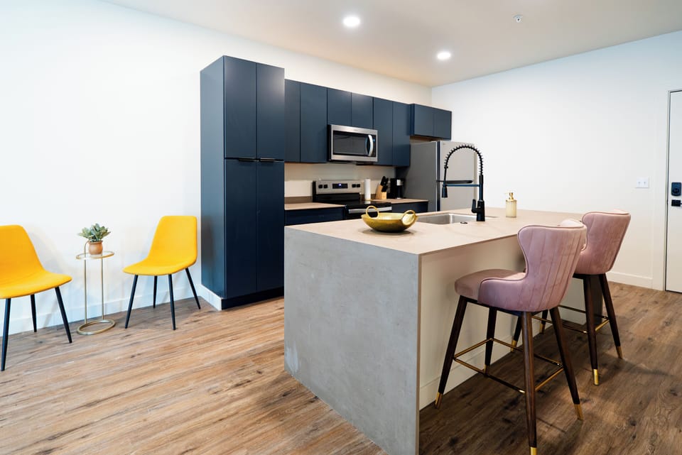 Family Suite, 1 Bedroom | Private kitchen | Full-size fridge, microwave, oven, stovetop