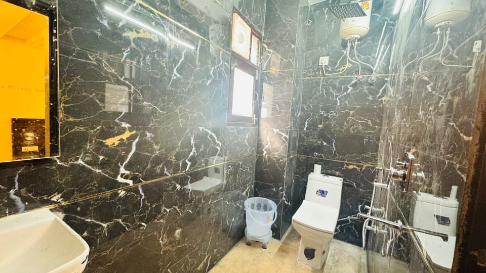 Shower, towels, soap, shampoo