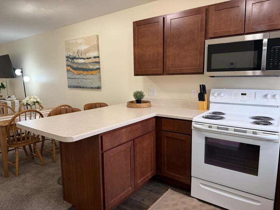 Cooktop and prep space ready for easy meals or late night snacks