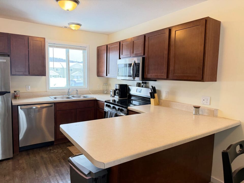 Bright and functional kitchen with room to gather and cook