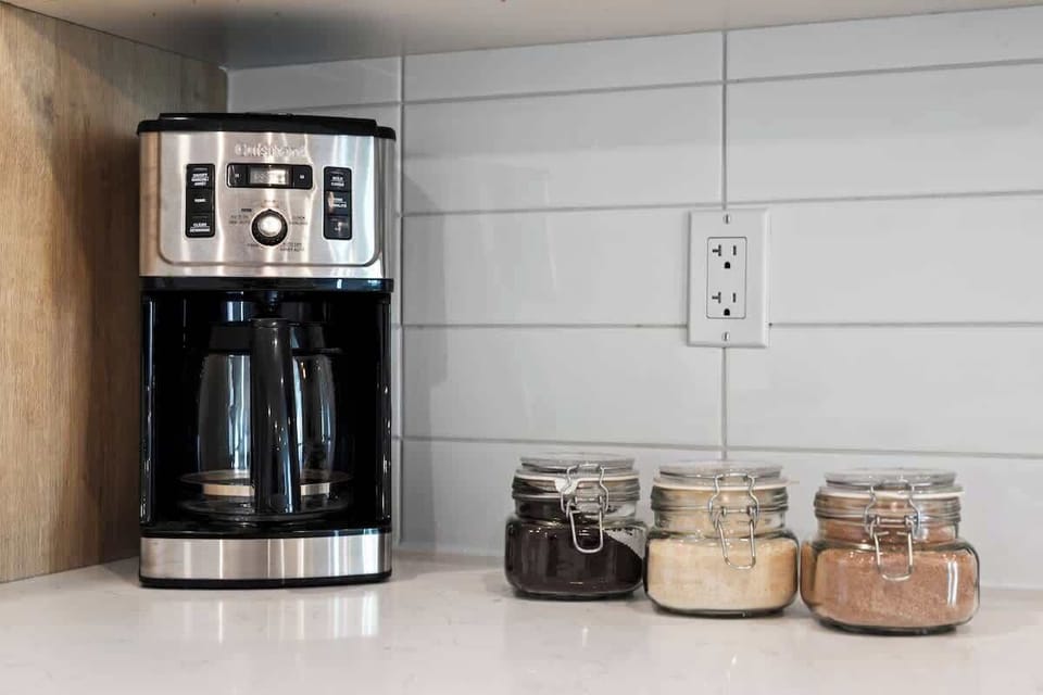 Coffee station with free locally roasted coffee, organic cane sugar & hot cocoa