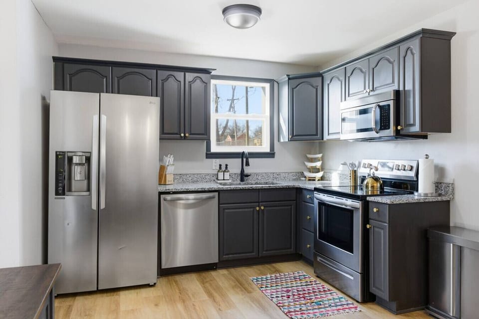 The kitchen is fully equipped with high-end appliances and all the cooking essentials you may need. Enjoy meals at the dining table.