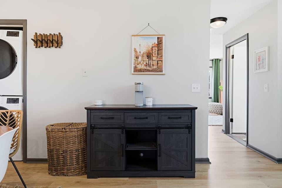The kitchen is fully equipped with appliances and all the cooking essentials you may need. Enjoy meals at the dining table.