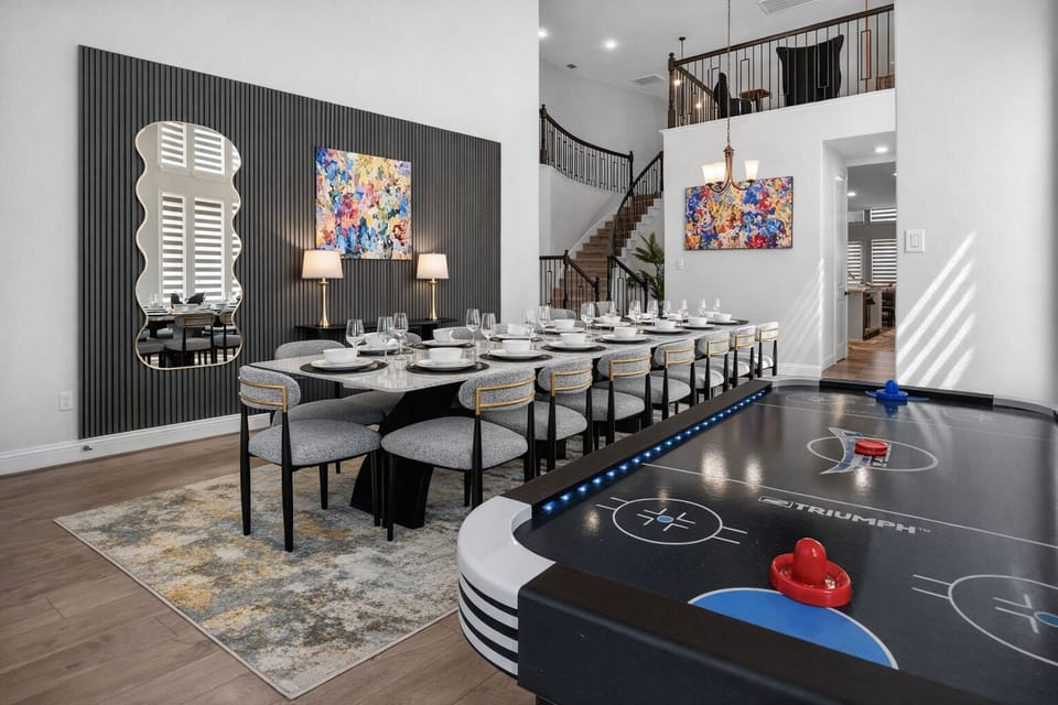 Air hockey and a grand dining table for non-stop group fun!