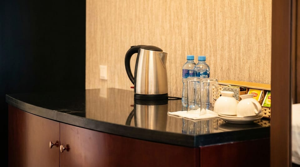 Deluxe Double Room, Balcony, City View | Coffee and/or coffee maker