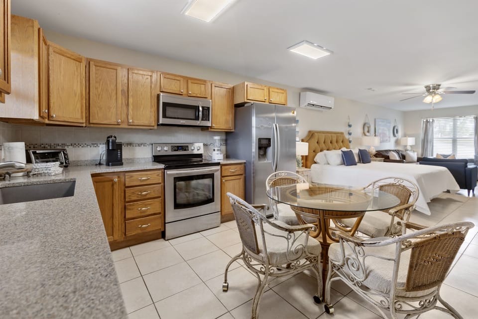 Your open-concept space flows seamlessly from kitchen to dining to bedroom, perfect for relaxing getaways.