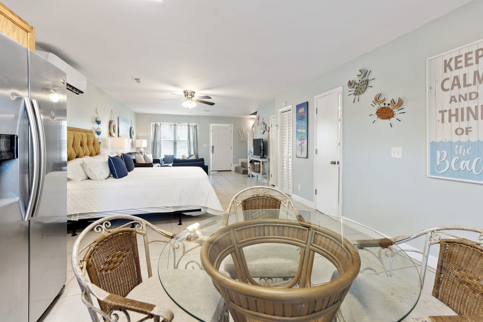 Relax in your coastal studio where beach vibes meet comfort—soft linens, ocean-themed décor, and modern amenities create your perfect beachside retreat.