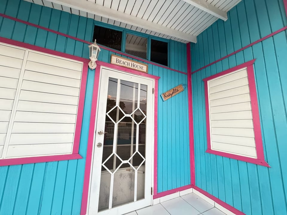 Welcome to your colorful retreat! Step into comfort through this inviting entrance.