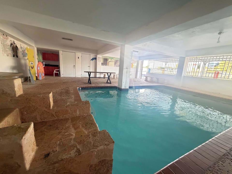 Immerse yourself in our bright indoor pool area, perfect for a refreshing swim or lounge.