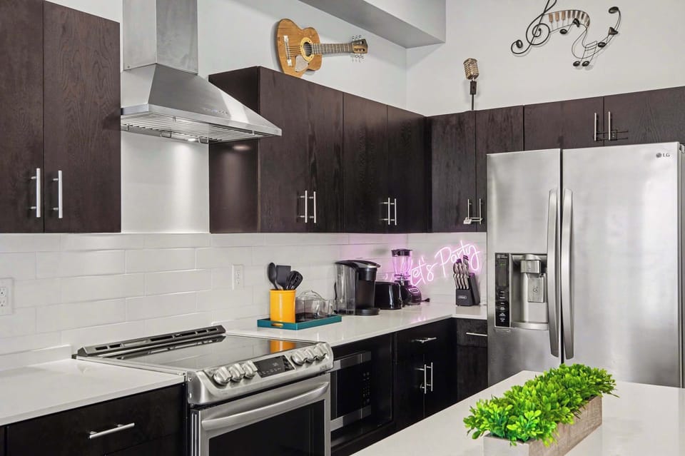 Modern open kitchen and dining with island seating 