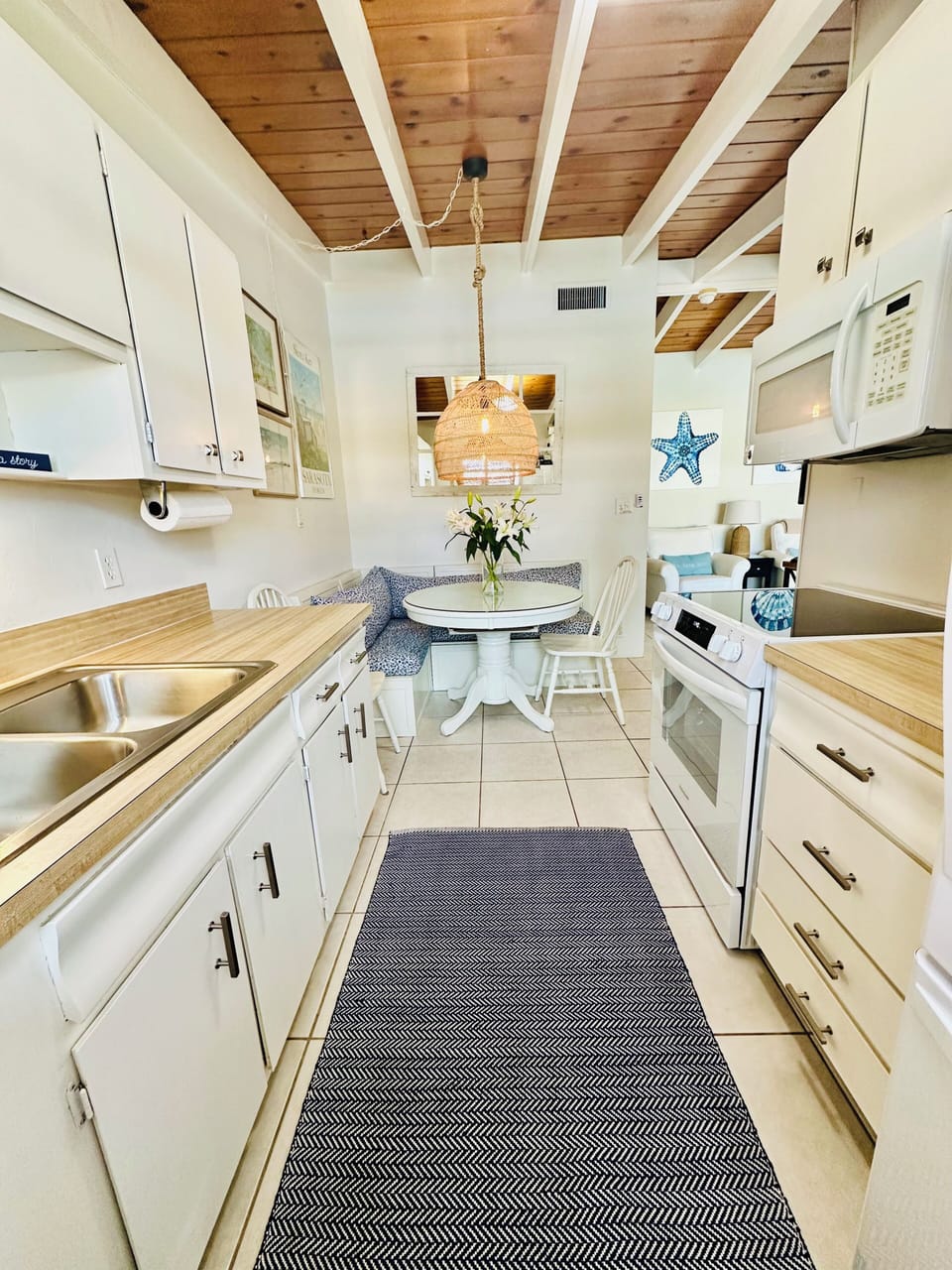 Kitchen with new range and new fridge (with ice maker).