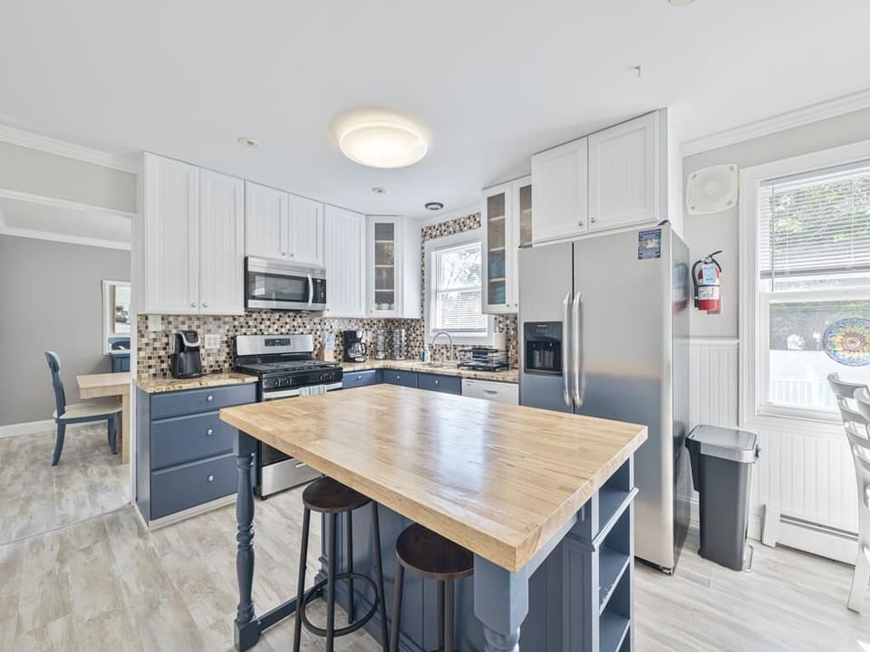 Enjoy easy meal times at the kitchen island, surrounded by contemporary decor and light-filled spaces.