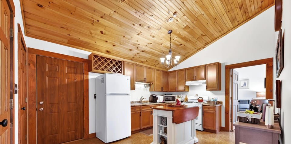 Cozy kitchen with warm wood accents and open layout