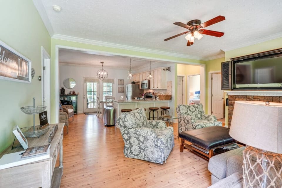 Living Room | Stone Fireplace, Cozy Seating & Open Gathering Space