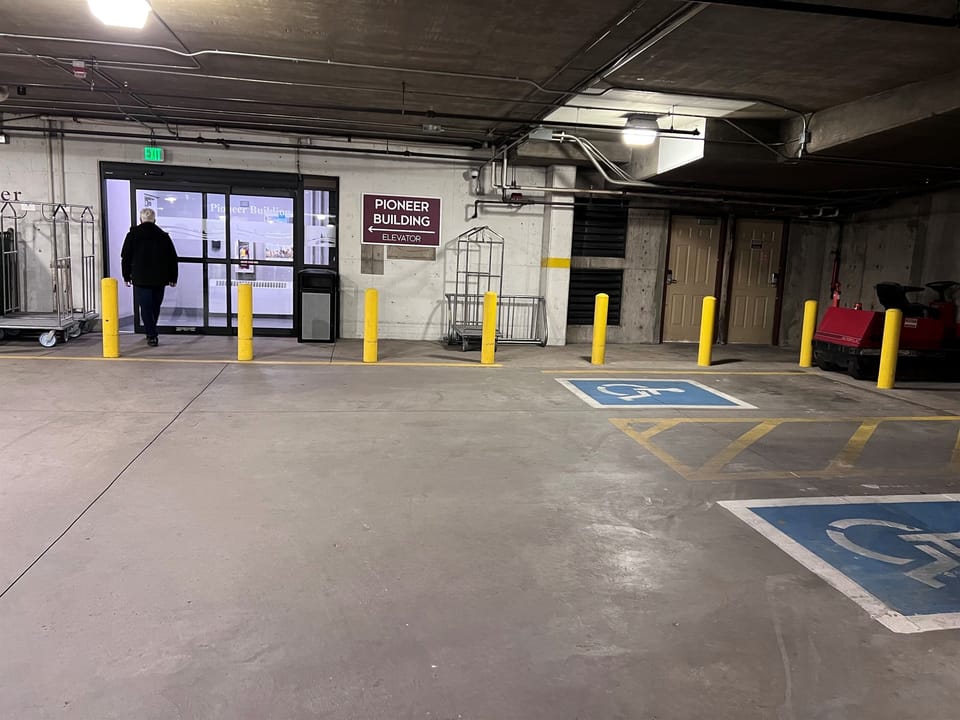 Disabled Parking available right outside Pioneer Bldg entrace, Marriott Summit Watch parking garage