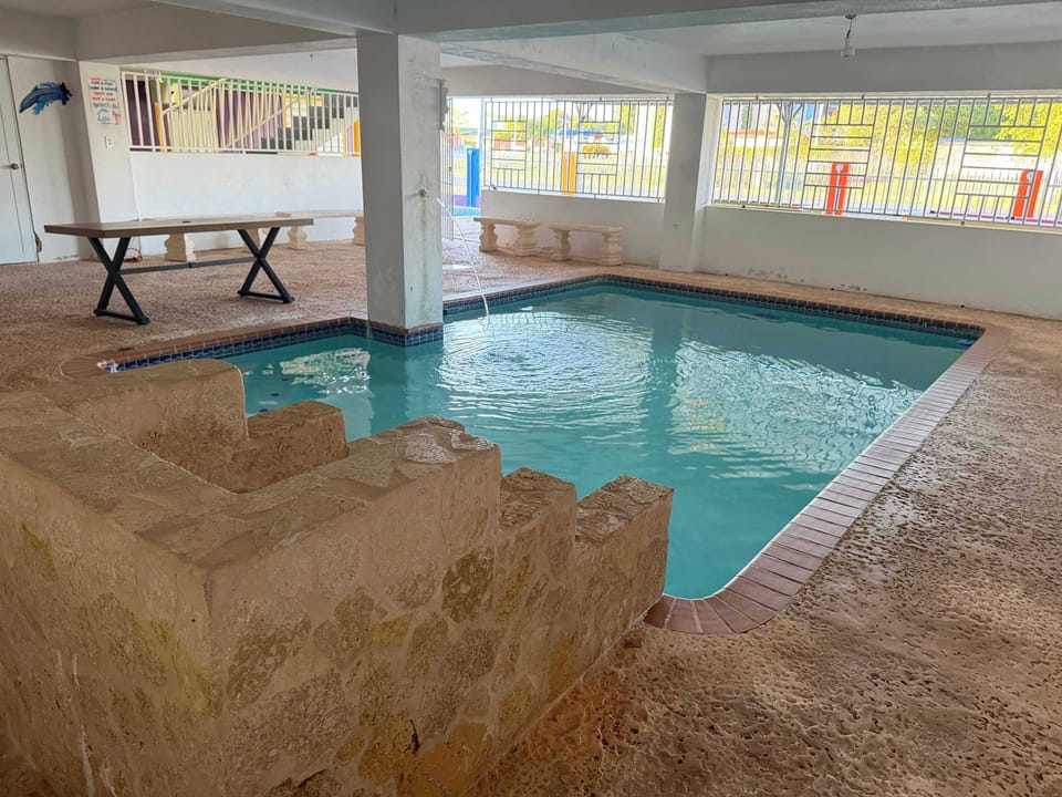 Cool off in our inviting indoor pool, complete with easy access steps.