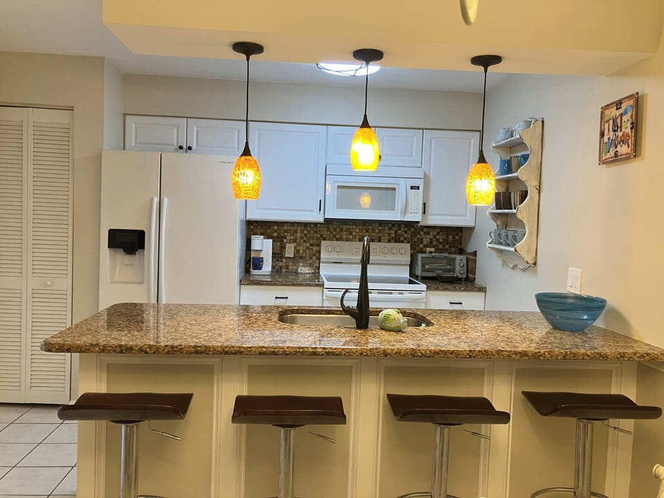 Kitchen with everything you need to enjoy dining in. 