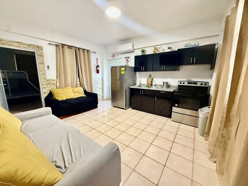Fully equipped kitchen & comfortable living area to relax and enjoy your stay.