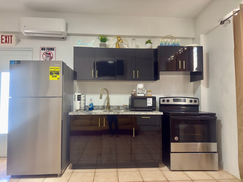 Whip up delicious meals in our fully equipped, modern kitchen space.