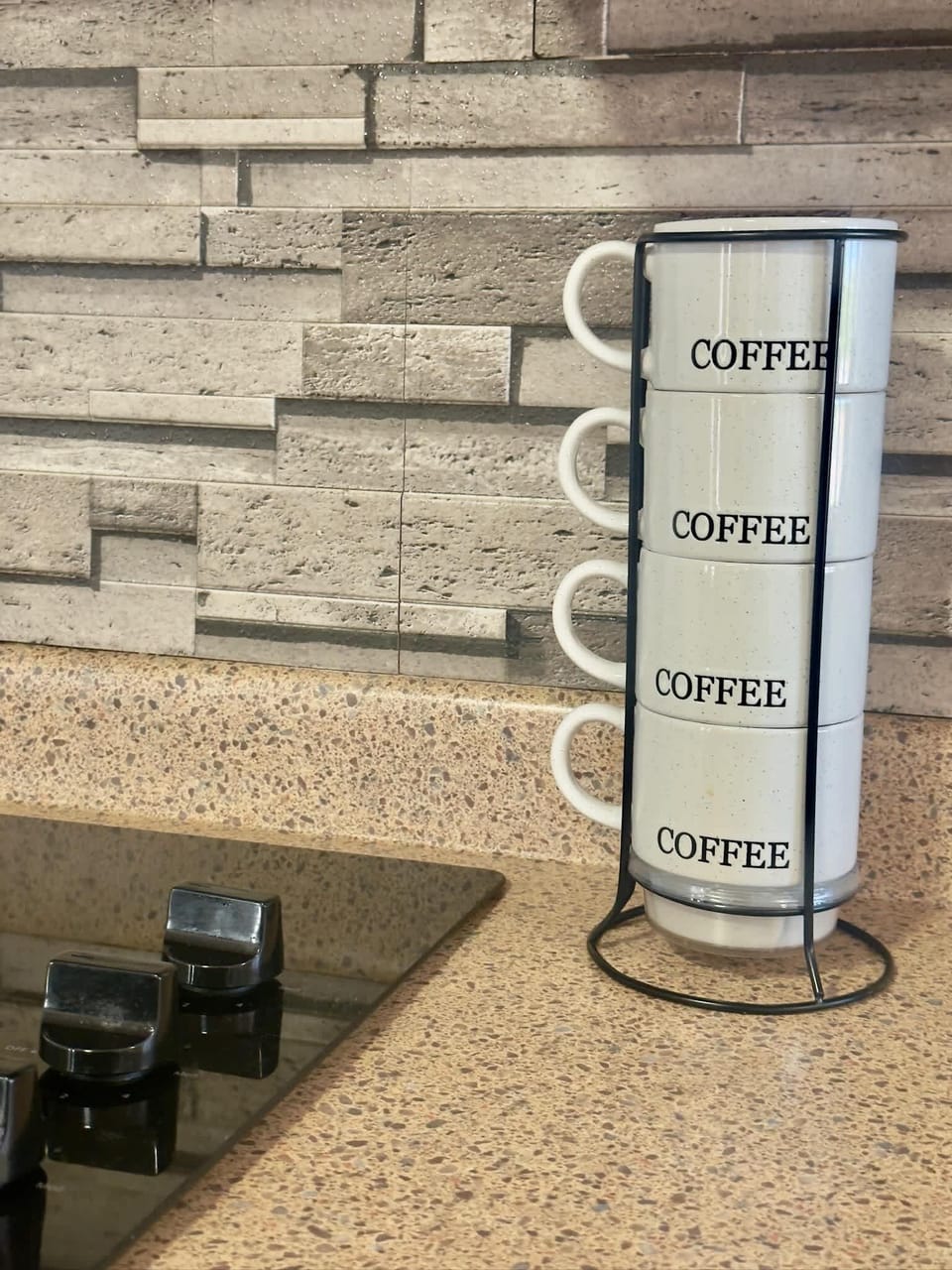 Coffee mugs conveniently placed in the kitchen for your morning routine.