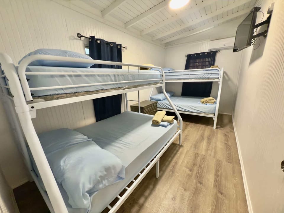 Spacious room with comfy twin/full bunk beds. Perfect for groups exploring Cabo Rojo!