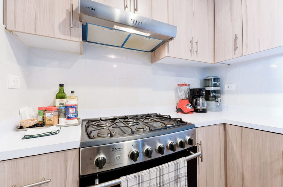 Exclusive Suite, Balcony, City View | Private kitchen | Full-size fridge, microwave, stovetop, blender