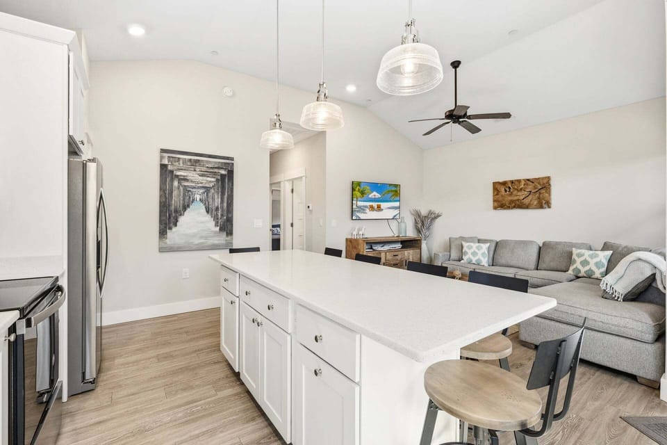 The kitchen and dining area feature an open layout with everything needed to prepare meals during your stay.