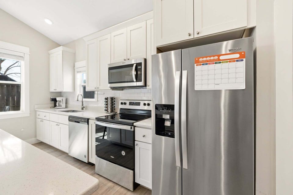 The kitchen and dining area feature an open layout with everything needed to prepare meals during your stay.