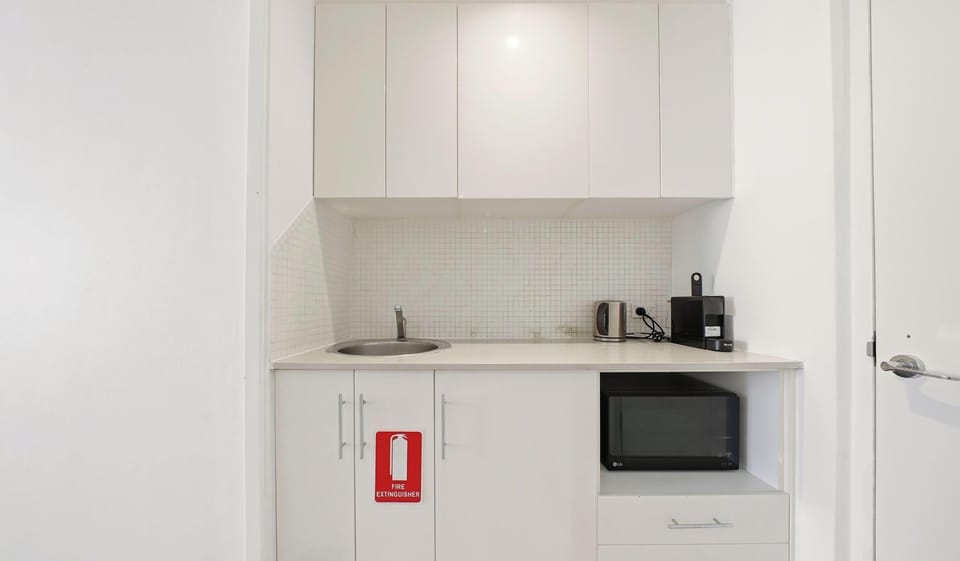 Compact kitchenette with essential appliances