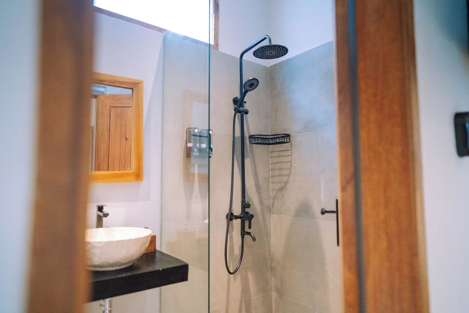 Family Studio with Private Kitchen (Two Queen Beds) | Bathroom | Shower, free toiletries, bidet, towels