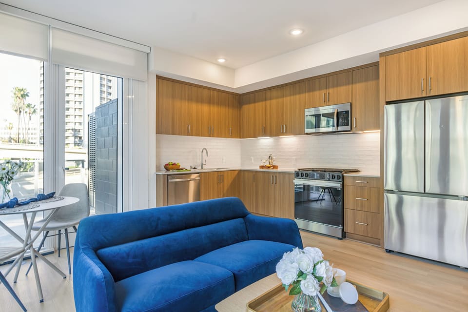 Unit 210: Open-concept layout space.