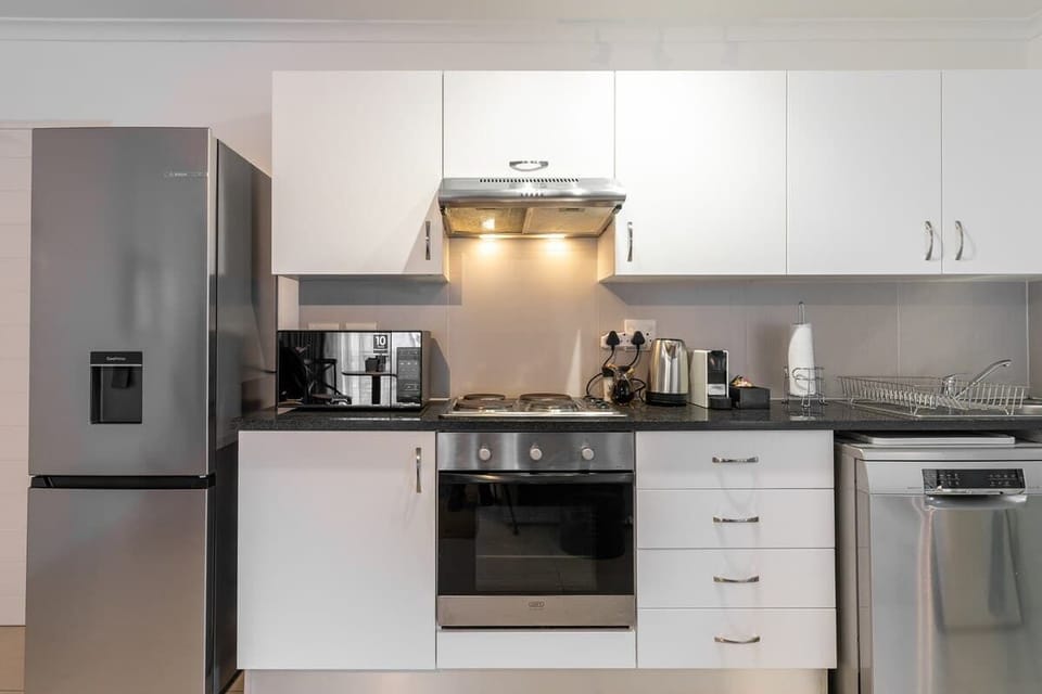 Nespresso machine, microwave and dishwasher for your convenience