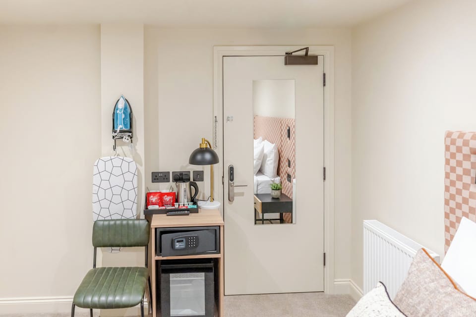 Classic Double Room, City View | Minibar, desk, laptop workspace, blackout drapes