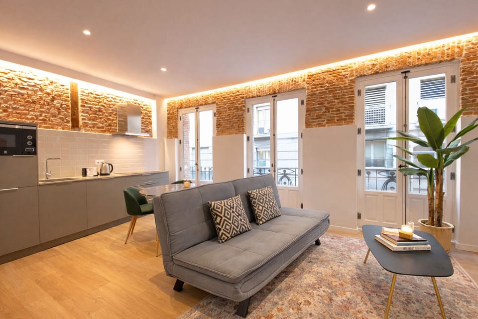 Classic Apartment, Balcony | Living area | Flat-screen TV