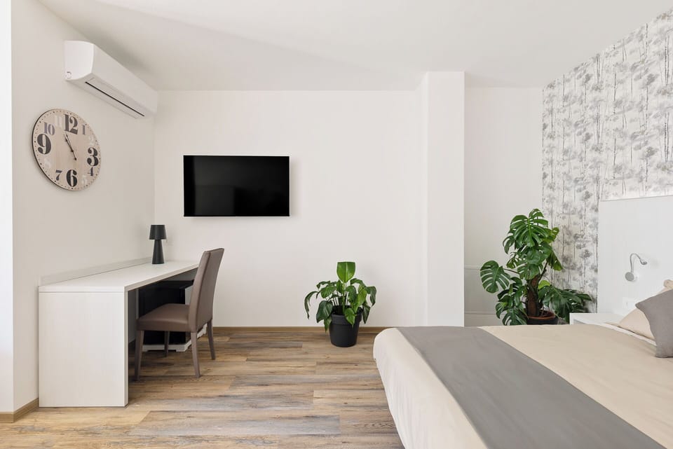 Superior Quadruple Room, Garden View | Desk, laptop workspace, soundproofing, free WiFi
