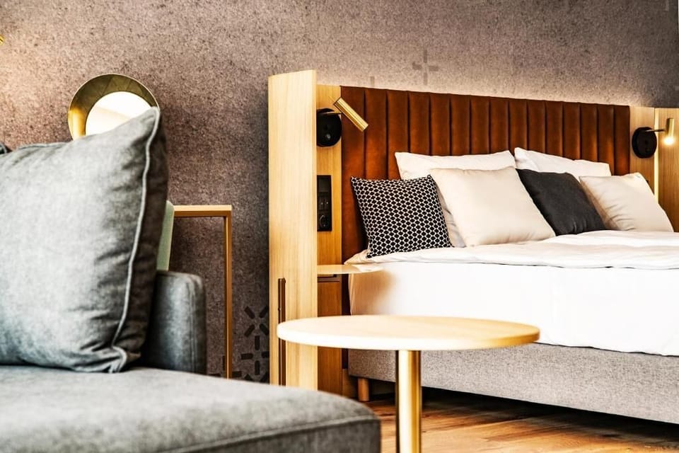 Luxury Suite, River View | In-room safe, desk, laptop workspace, blackout drapes