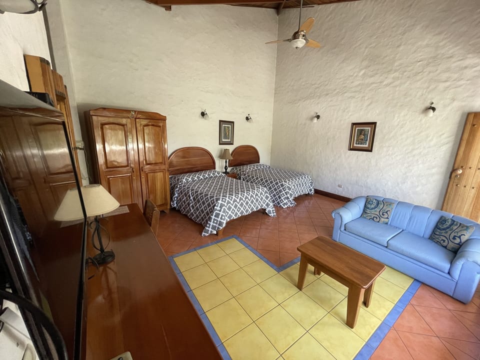 Superior Room, 2 Double Beds, Private Bathroom | In-room safe, individually decorated, individually furnished, desk
